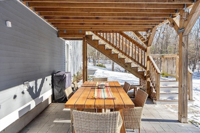 view of snow covered patio