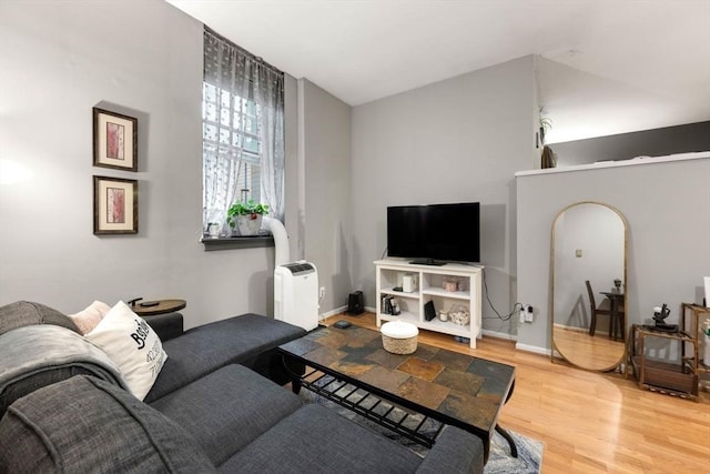 350 W 4th St Unit 103, Boston, MA 02127 - living room featuring wood finished floors and baseboards