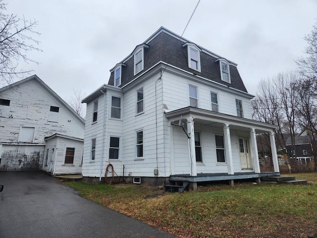 18 Central St, Ashburnham, MA 01430 - second empire-style home featuring covered porch, mansard roof, and a shingled roof