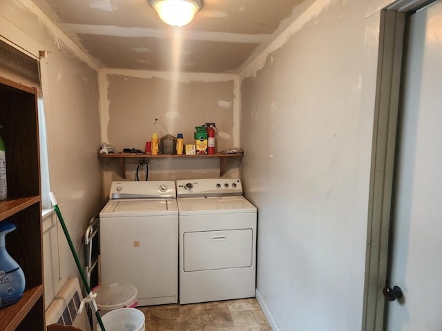 18 Central St, Ashburnham, MA 01430 - washroom with washing machine and clothes dryer and light stone finish floors