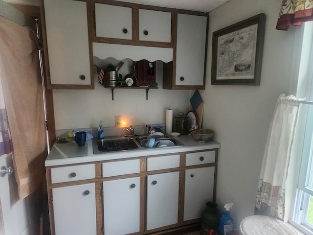 18 Central St, Ashburnham, MA 01430 - kitchen with light countertops, white cabinetry, and open shelves