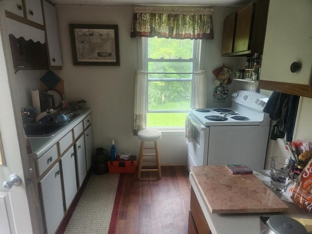 18 Central St, Ashburnham, MA 01430 - laundry area featuring wood finished floors and plenty of natural light