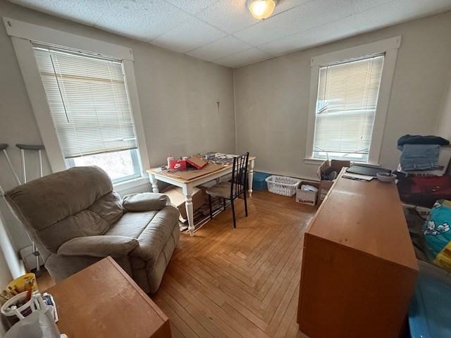 interior space featuring parquet flooring