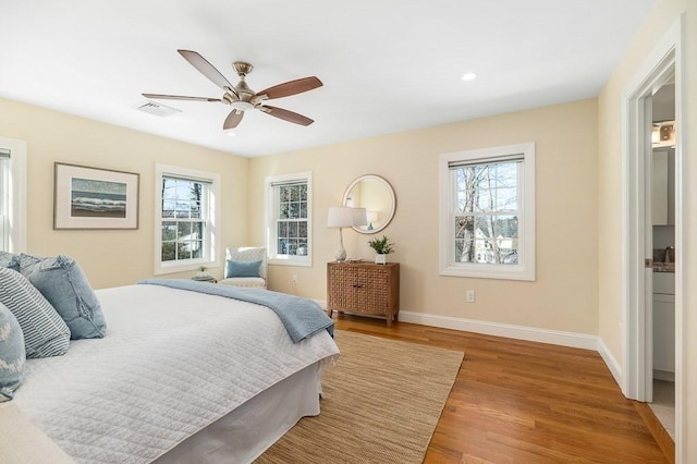 bedroom featuring ceiling fan and wood-type flooring