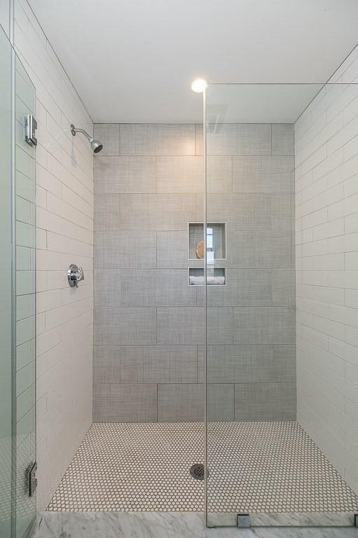 bathroom featuring walk in shower