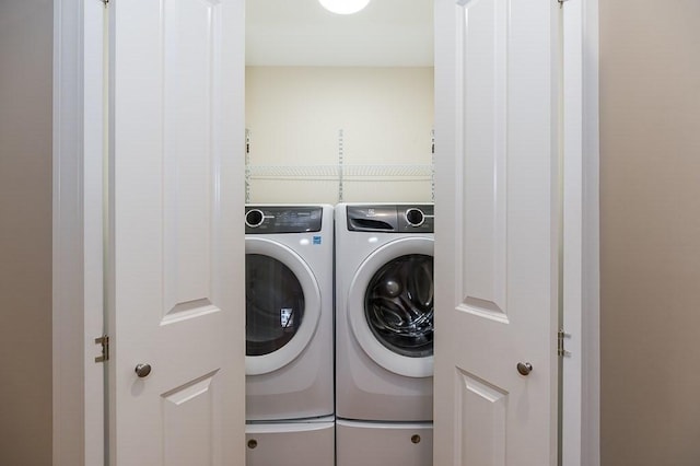 laundry room with washer and dryer