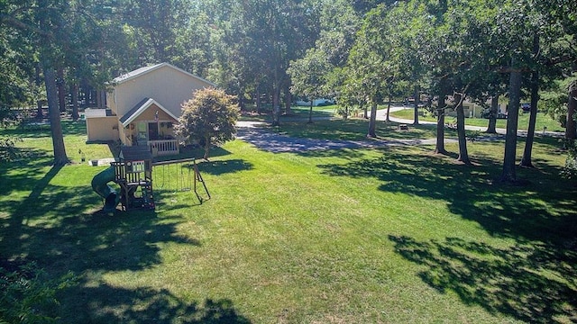 view of yard with a playground