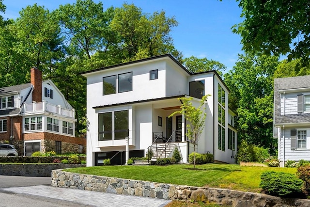 17 Prospect Hill Rd, Lexington, MA 02420 - contemporary house featuring stucco siding, a front yard, and stairway