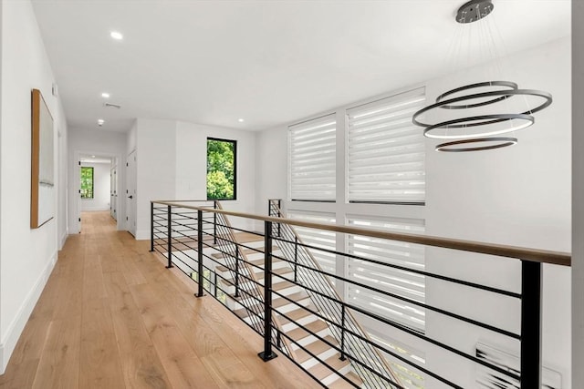 17 Prospect Hill Rd, Lexington, MA 02420 - hall featuring an upstairs landing, baseboards, plenty of natural light, light wood-style flooring, and recessed lighting