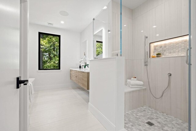 17 Prospect Hill Rd, Lexington, MA 02420 - bathroom featuring walk in shower, vanity, and healthy amount of natural light