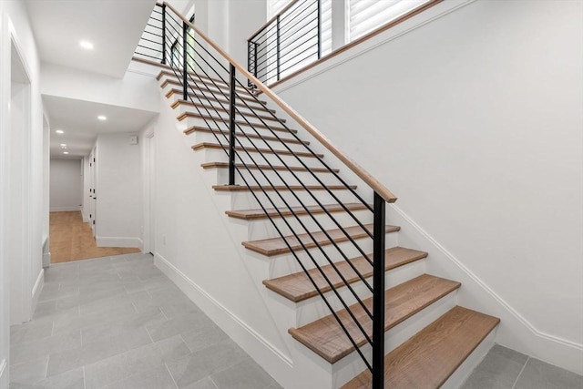 17 Prospect Hill Rd, Lexington, MA 02420 - staircase featuring baseboards, recessed lighting, and tile patterned flooring