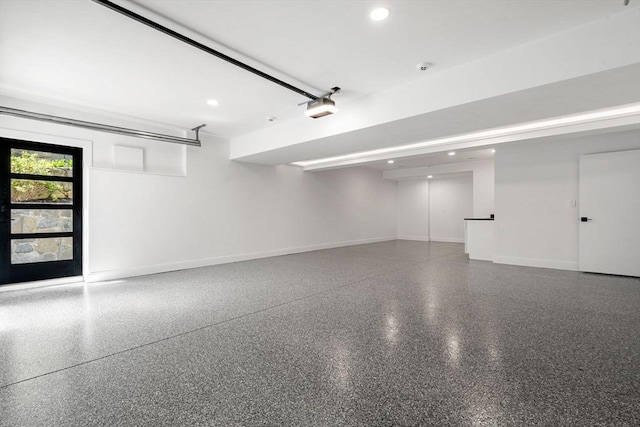 17 Prospect Hill Rd, Lexington, MA 02420 - garage featuring baseboards, recessed lighting, and a garage door opener