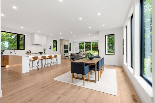 17 Prospect Hill Rd, Lexington, MA 02420 - dining area with light wood-style floors and recessed lighting