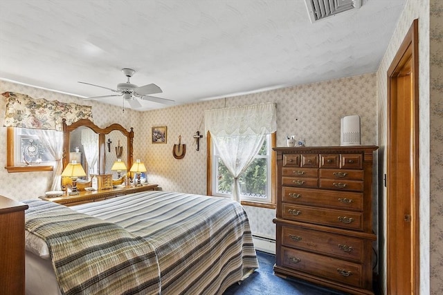 8 Janis Ter, Woburn, MA 01801 - bedroom featuring wallpapered walls, a baseboard heating unit, and ceiling fan