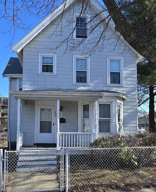 view of property featuring a porch