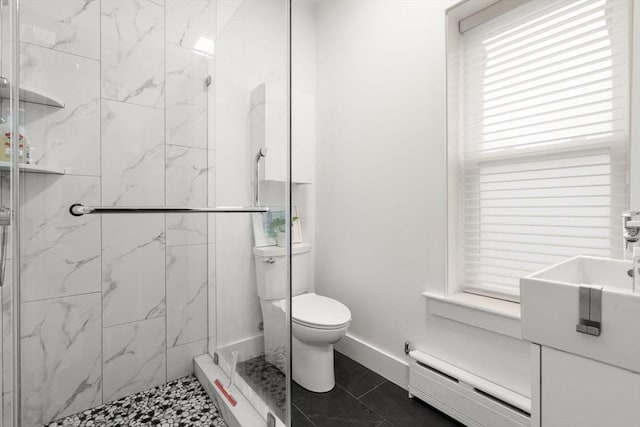 full bathroom with baseboard heating, toilet, and a marble finish shower