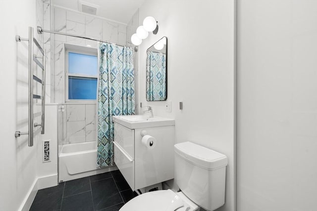 bathroom featuring toilet, shower / bath combination with curtain, tile patterned floors, vanity, and baseboards
