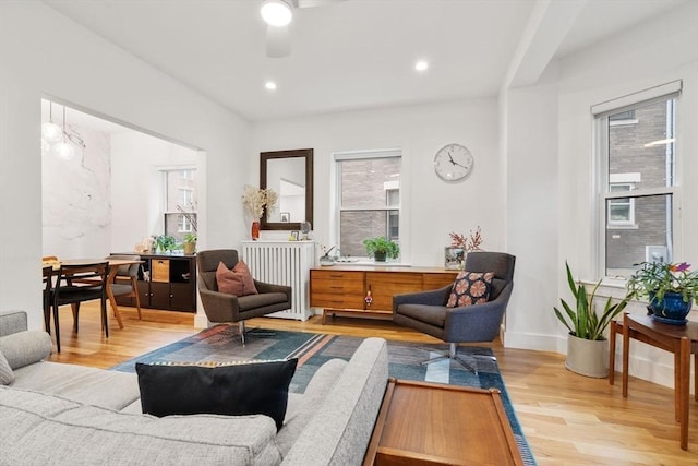 sitting room featuring light wood finished floors, a ceiling fan, baseboards, and recessed lighting