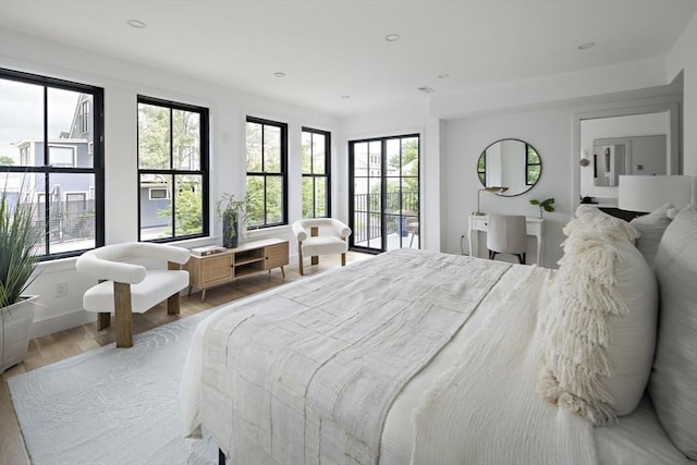 361 Walden Unit 361, Cambridge, MA 02138 - bedroom with wood finished floors and recessed lighting