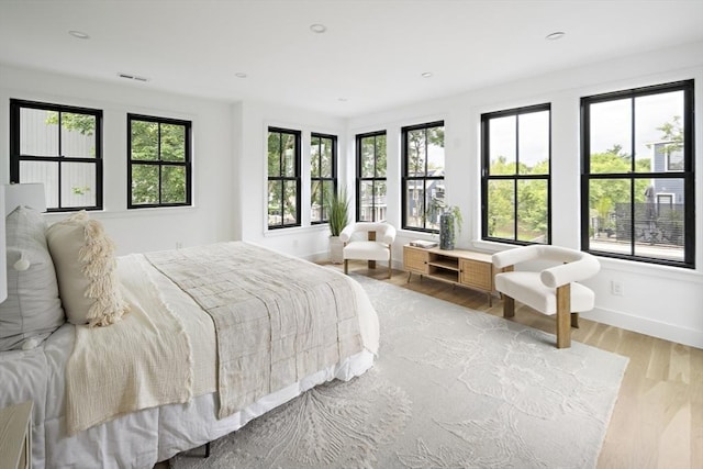 361 Walden Unit 361, Cambridge, MA 02138 - bedroom featuring light wood finished floors and recessed lighting
