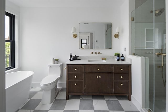 361 Walden Unit 361, Cambridge, MA 02138 - full bath with vanity, a stall shower, a freestanding bath, and tile patterned floors