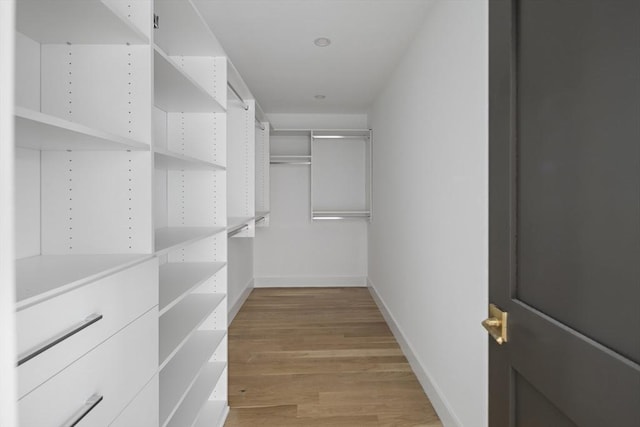 361 Walden Unit 361, Cambridge, MA 02138 - walk in closet with light wood finished floors