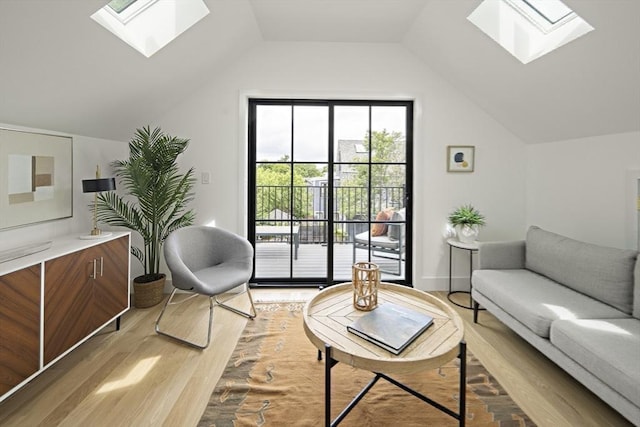 361 Walden Unit 361, Cambridge, MA 02138 - living room featuring a skylight, light wood-type flooring, and lofted ceiling
