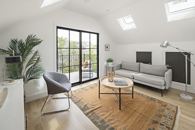 361 Walden Unit 361, Cambridge, MA 02138 - living room with a skylight, lofted ceiling, and wood finished floors