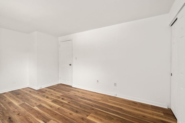 172 Bishop Dr Unit 172, Framingham, MA 01702 - empty room featuring wood finished floors and baseboards