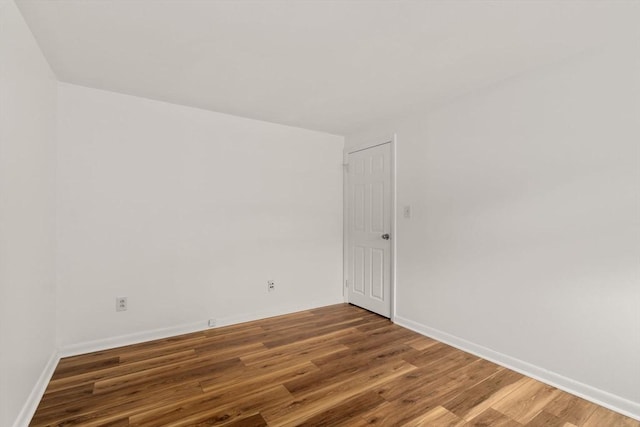 172 Bishop Dr Unit 172, Framingham, MA 01702 - spare room with wood finished floors and baseboards