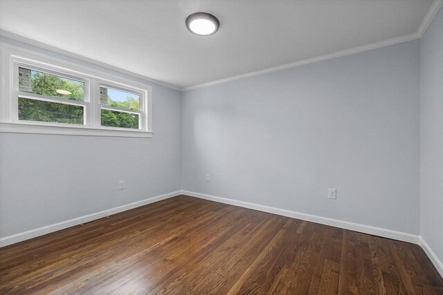 8 Piedmont St, Methuen, MA 01844 - unfurnished room with baseboards, ornamental molding, and dark wood-style flooring
