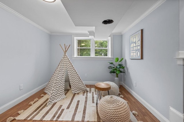 8 Piedmont St, Methuen, MA 01844 - game room with wood finished floors, baseboards, and crown molding