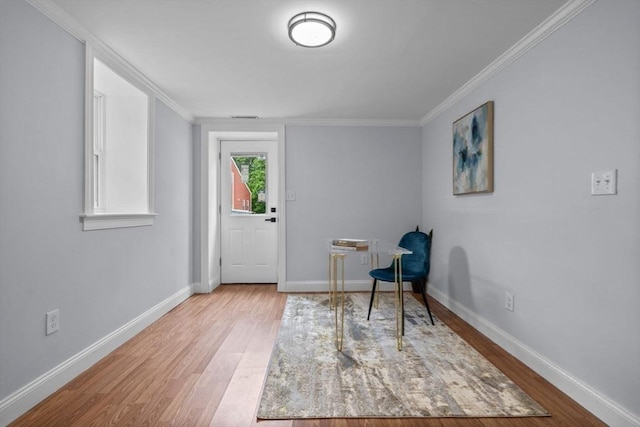 8 Piedmont St, Methuen, MA 01844 - sitting room with wood finished floors, ornamental molding, and baseboards