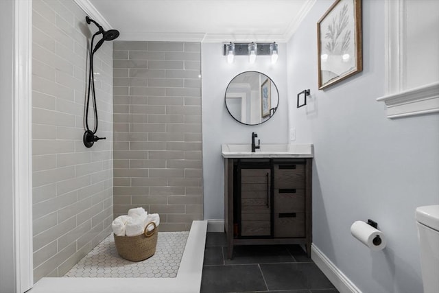 8 Piedmont St, Methuen, MA 01844 - full bath featuring ornamental molding, tile patterned floors, tiled shower, toilet, and vanity