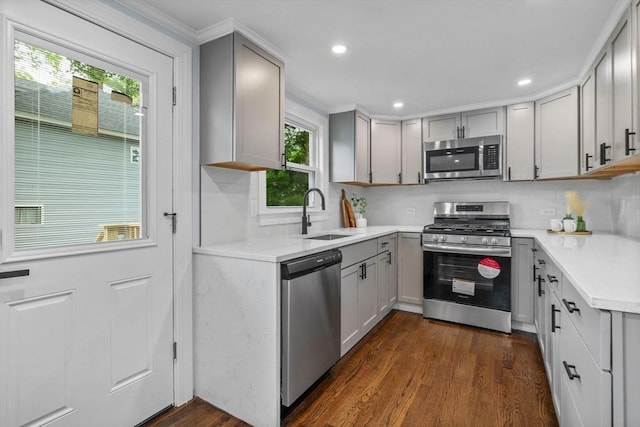 8 Piedmont St, Methuen, MA 01844 - kitchen with stainless steel appliances, a sink, gray cabinets, dark wood finished floors, and recessed lighting