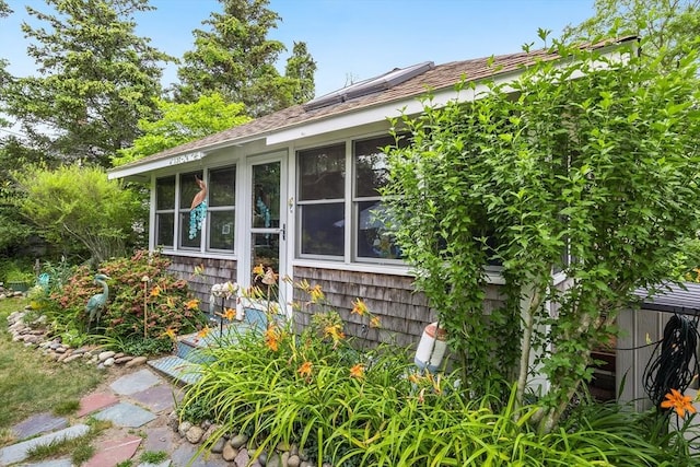137 Rock Harbor Rd Unit 4, Orleans, MA 02653 - view of property exterior with a sunroom