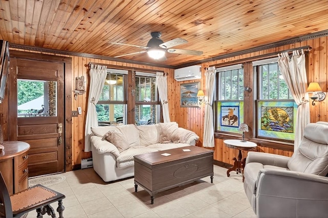 137 Rock Harbor Rd Unit 4, Orleans, MA 02653 - living area featuring a wall mounted AC, healthy amount of natural light, wood walls, light tile patterned flooring, and ceiling fan