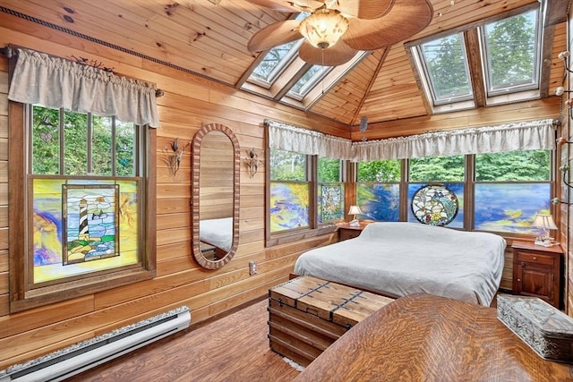 137 Rock Harbor Rd Unit 4, Orleans, MA 02653 - bedroom featuring a skylight, a baseboard radiator, wooden walls, wooden ceiling, and lofted ceiling