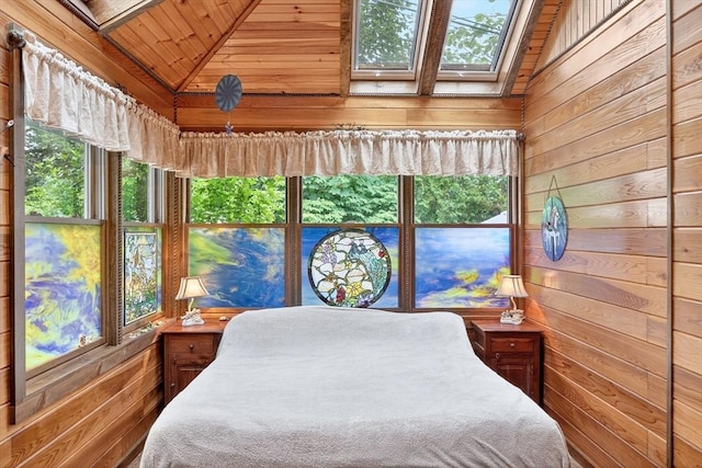 137 Rock Harbor Rd Unit 4, Orleans, MA 02653 - bedroom featuring wooden walls, a skylight, wooden ceiling, and lofted ceiling
