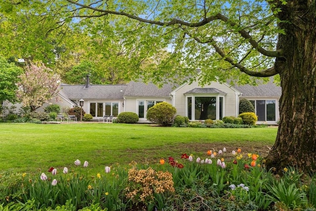 38 Bullard St, Sherborn, MA 01770 - rear view of house with a yard