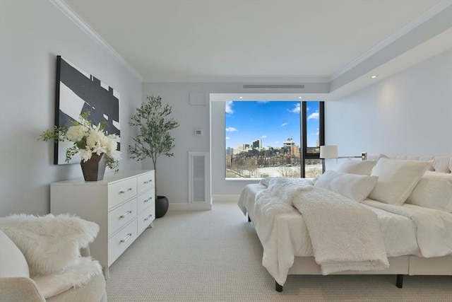 carpeted bedroom with crown molding