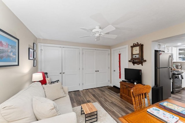 11 Winslow Way, Swansea, MA 02777 - living area featuring dark wood finished floors and ceiling fan