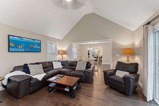 11 Winslow Way, Swansea, MA 02777 - living room with wood finished floors, baseboards, a ceiling fan, a chandelier, and high vaulted ceiling