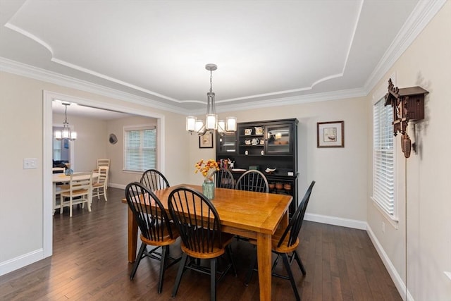 11 Winslow Way, Swansea, MA 02777 - dining space with a chandelier, plenty of natural light, dark wood finished floors, and ornamental molding