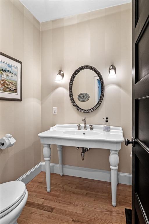 5 Carolina Way, Boxford, MA 01921 - half bath featuring wood finished floors and baseboards