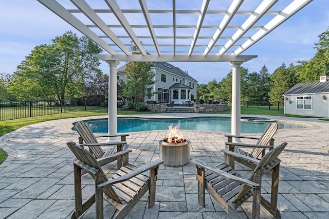 5 Carolina Way, Boxford, MA 01921 - view of pool with a pergola, a fire pit, an outdoor structure, a patio, and a storage structure