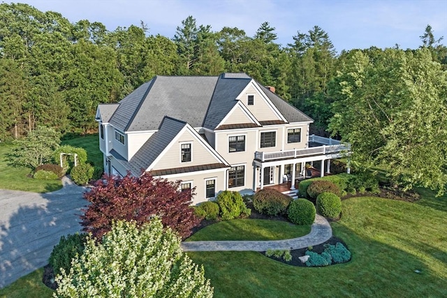 5 Carolina Way, Boxford, MA 01921 - view of front of house featuring a standing seam roof, a front lawn, a metal roof, and a forest view
