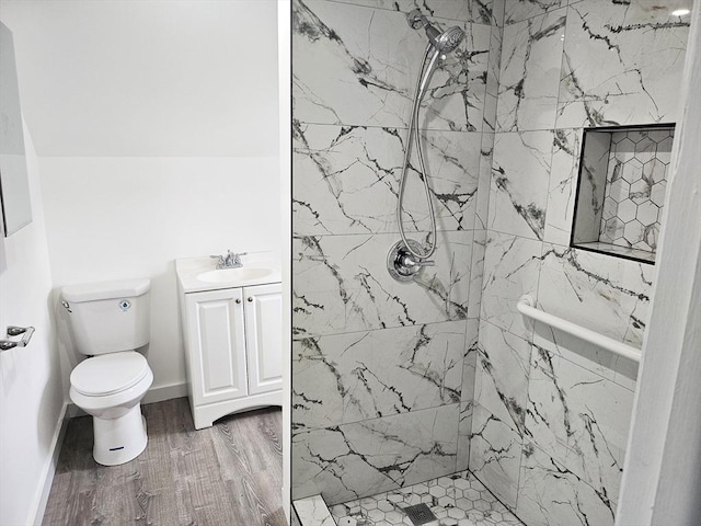 21 High St, South Hadley, MA 01075 - bathroom featuring a shower stall, vanity, and wood finished floors