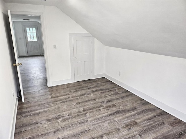 21 High St, South Hadley, MA 01075 - additional living space with lofted ceiling and dark wood finished floors