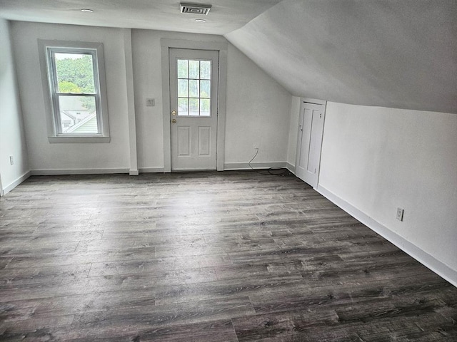 21 High St, South Hadley, MA 01075 - bonus room with dark wood-type flooring, plenty of natural light, and vaulted ceiling